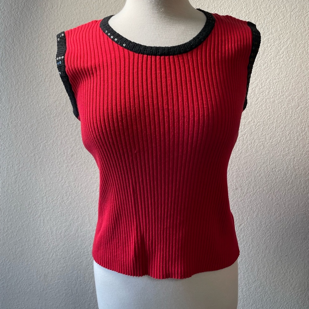 Beautiful red top that can be dressed up or down.